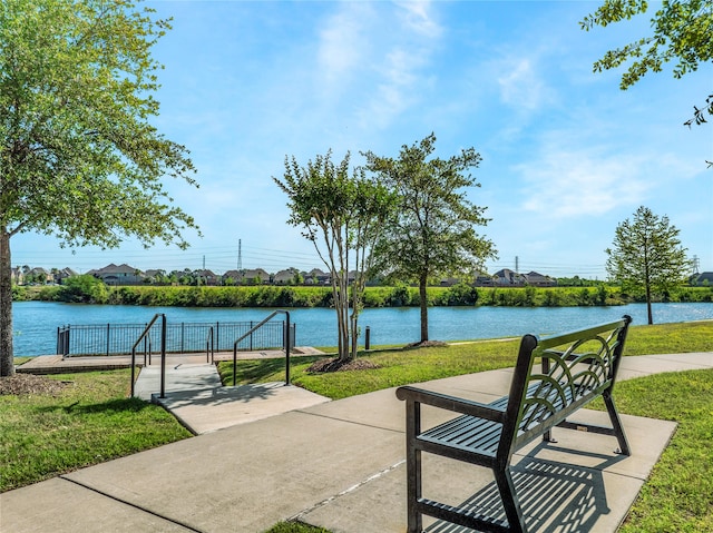 exterior space with a water view