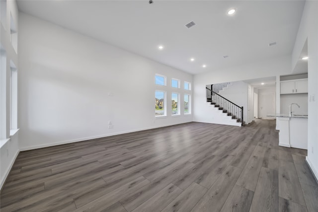 unfurnished living room featuring light wood-type flooring