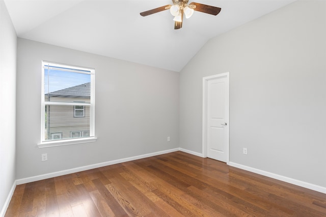 spare room with ceiling fan, lofted ceiling, and hardwood / wood-style flooring