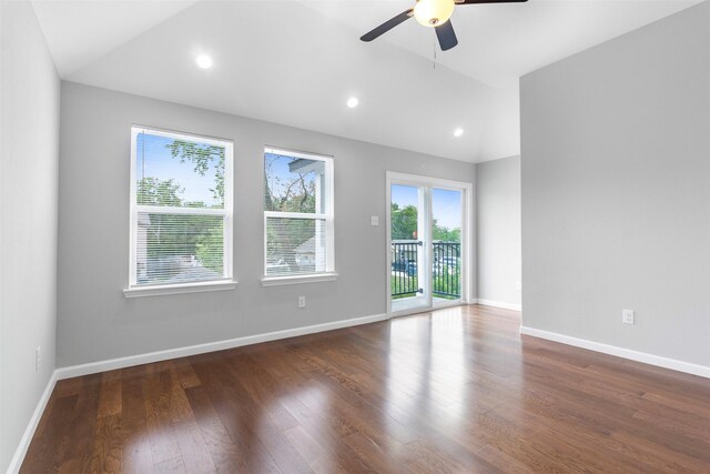 unfurnished room with hardwood / wood-style floors, vaulted ceiling, and ceiling fan