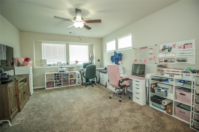 office featuring carpet and ceiling fan