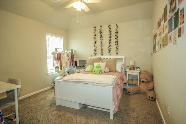 bedroom featuring ceiling fan, vaulted ceiling, and carpet flooring