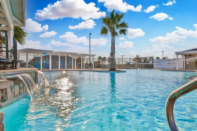 view of pool featuring pool water feature