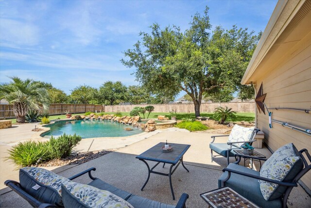 view of pool featuring a patio