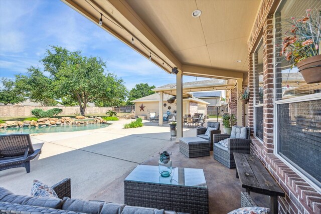 view of patio featuring a fenced in pool and an outdoor hangout area