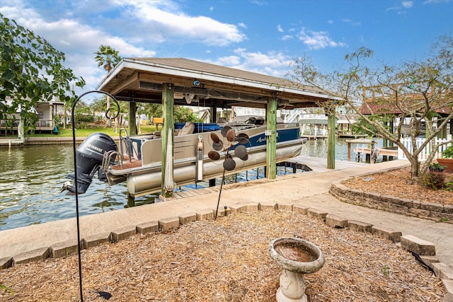 dock area featuring a water view