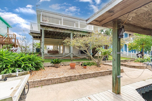 view of patio with a balcony