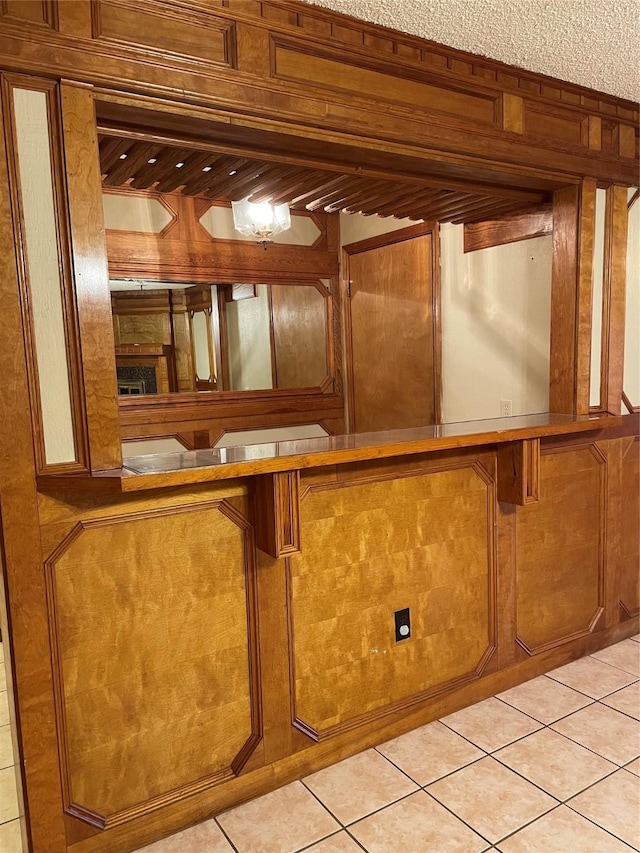 bar with light tile patterned floors