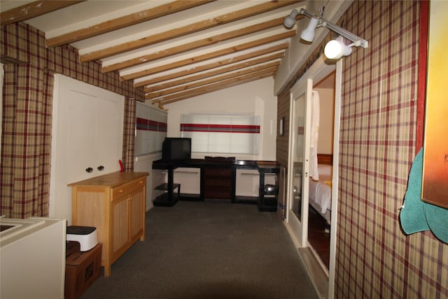 office area featuring vaulted ceiling with beams and dark carpet