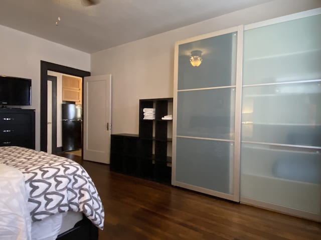 bedroom featuring wood-type flooring