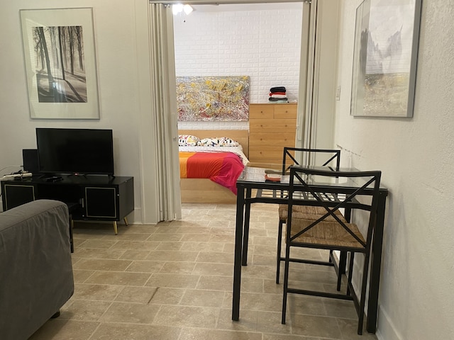 dining room with tile patterned flooring