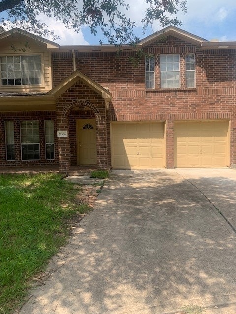 view of front of property with a garage