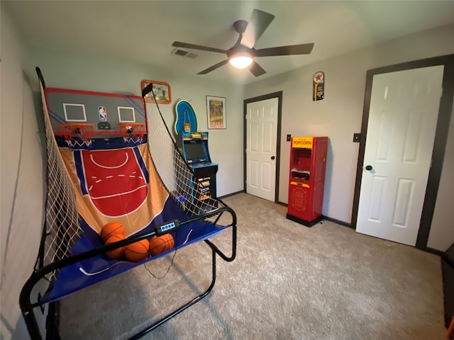 game room featuring carpet and ceiling fan