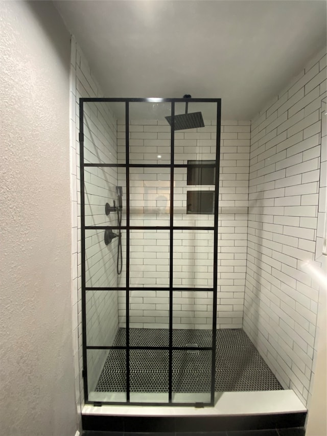 bathroom with an enclosed shower