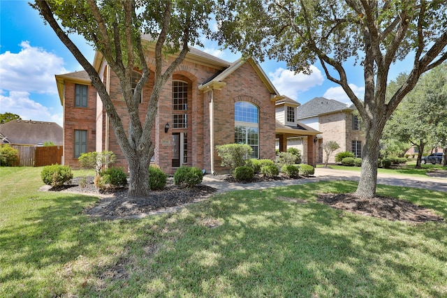 view of property with a front lawn