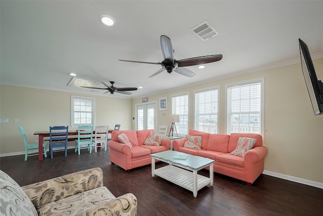 610 Surf Dr, Surfside Beach, TX 77541 - living area with wood finished floors, visible vents, and ornamental molding