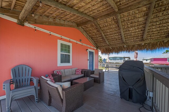 610 Surf Dr, Surfside Beach, TX 77541 - wooden deck with an outdoor living space