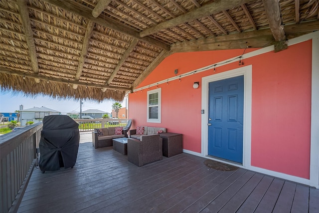 610 Surf Dr, Surfside Beach, TX 77541 - wooden terrace with an outdoor hangout area and grilling area