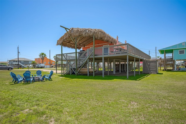 610 Surf Dr, Surfside Beach, TX 77541 - exterior space with a wooden deck, a yard, and stairway