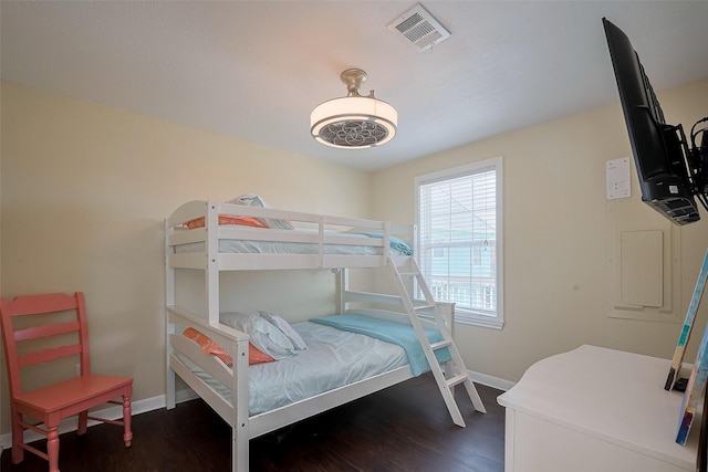 610 Surf Dr, Surfside Beach, TX 77541 - bedroom featuring visible vents, dark wood-style floors, and baseboards