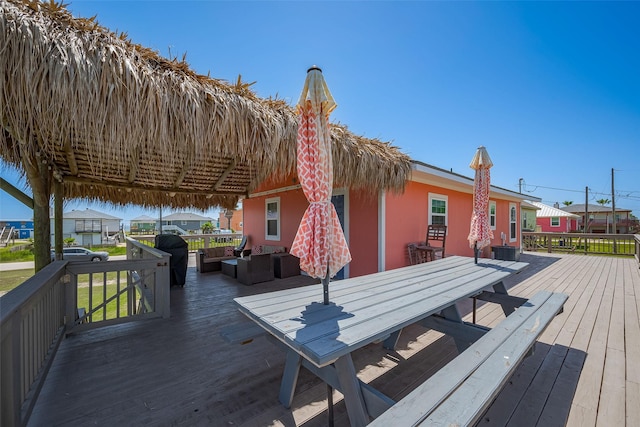 610 Surf Dr, Surfside Beach, TX 77541 - deck featuring an outdoor hangout area and outdoor dining space