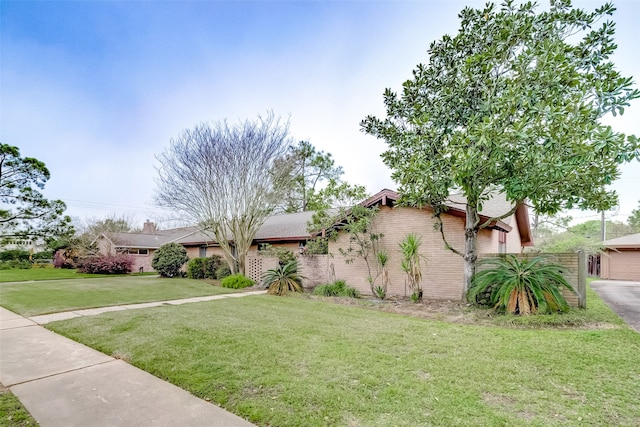 view of front of property with a front lawn