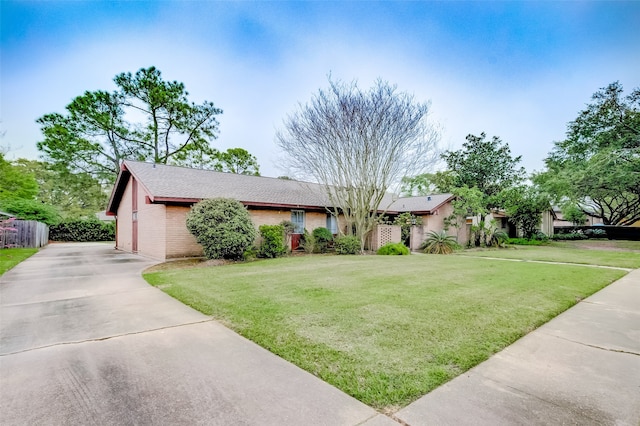 ranch-style house with a front yard