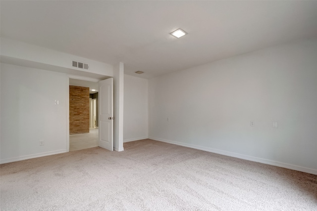 unfurnished bedroom featuring light carpet