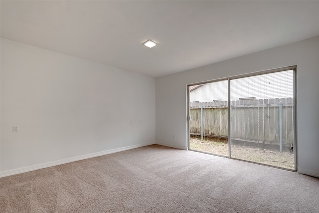 unfurnished room with carpet floors