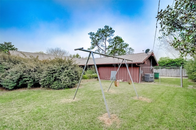 view of yard with central AC