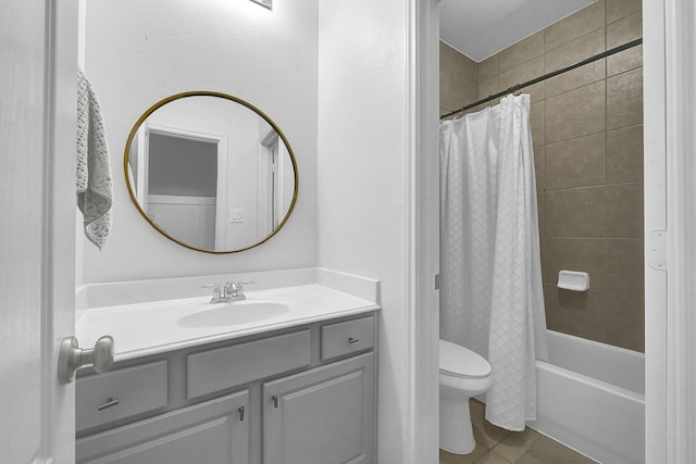 full bathroom featuring toilet, shower / bathtub combination with curtain, tile patterned flooring, and vanity