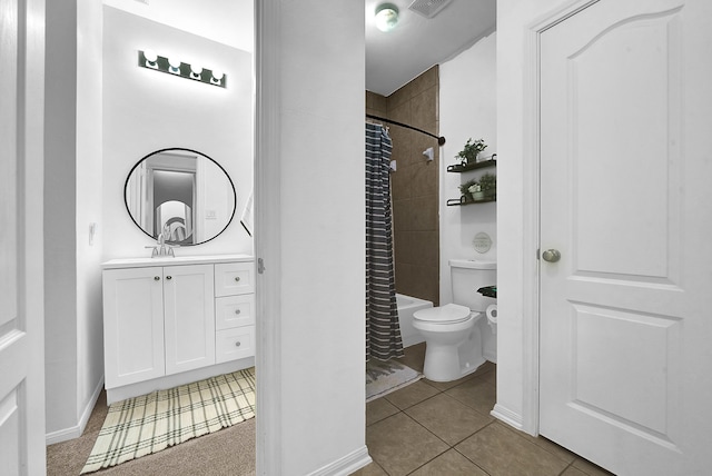 full bathroom with tile patterned floors, vanity, shower / bath combo, and toilet