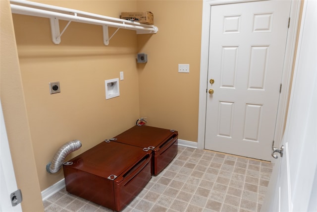 washroom featuring washer hookup, electric dryer hookup, and light tile patterned floors