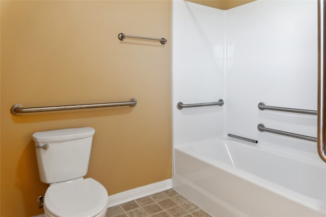 bathroom featuring toilet and tile patterned floors