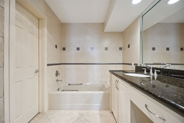 bathroom featuring tile walls, vanity, and tile patterned floors