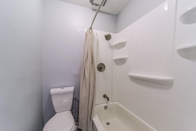 full bathroom featuring toilet and shower / bathtub combination with curtain