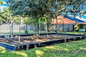 exterior space with a yard and fence