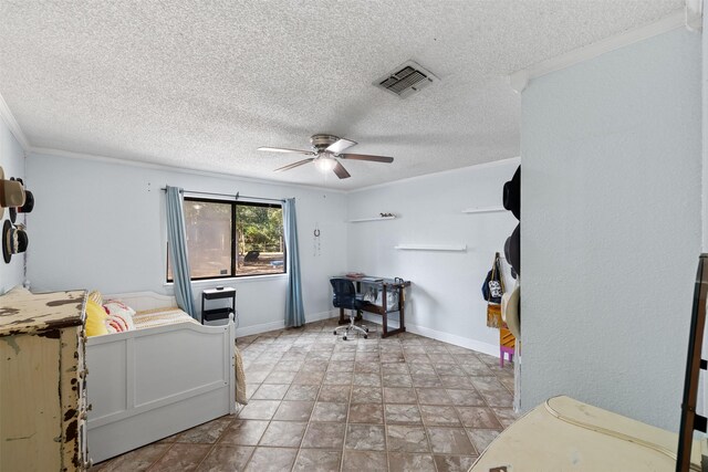130 Green Acres Loop, Bastrop, TX 78602 - bedroom with crown molding, baseboards, a textured ceiling, ceiling fan, and visible vents
