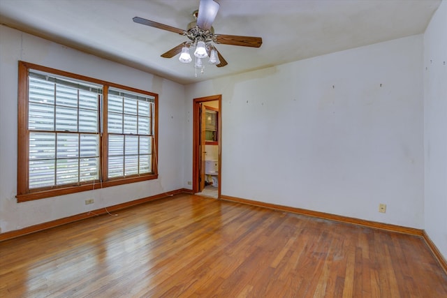 spare room with light hardwood / wood-style floors and ceiling fan