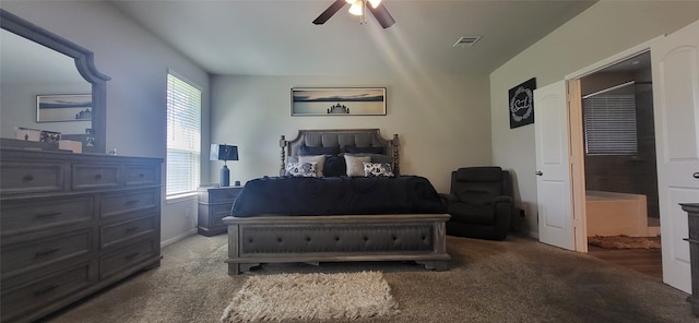 carpeted bedroom with ceiling fan and multiple windows