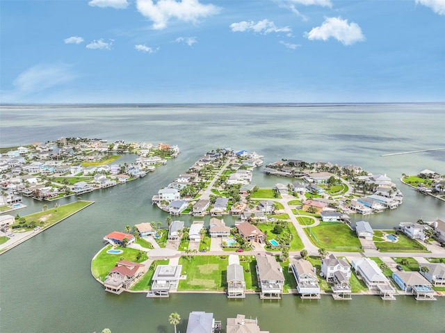 bird's eye view featuring a water view and a residential view