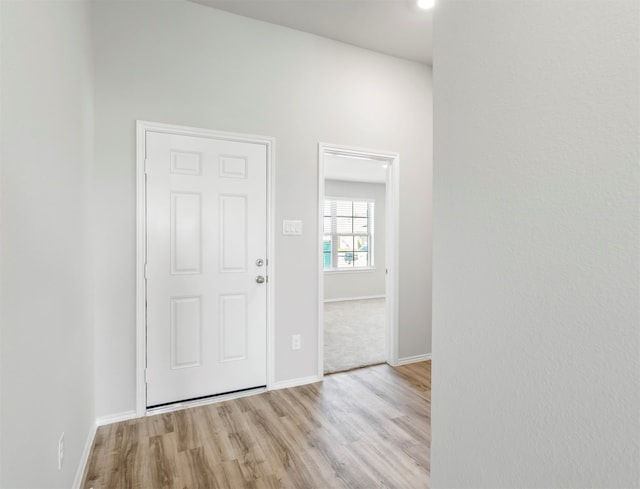 interior space featuring light colored carpet