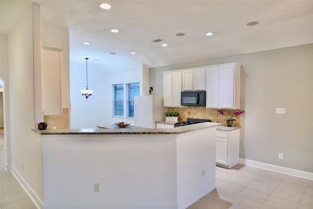 kitchen featuring white cabinetry, black appliances, kitchen peninsula, backsplash, and pendant lighting