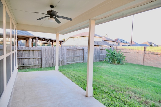 view of patio / terrace featuring ceiling fan