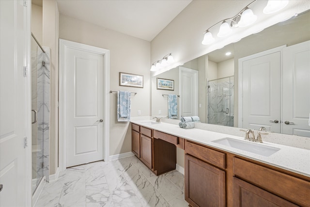 bathroom featuring vanity and an enclosed shower