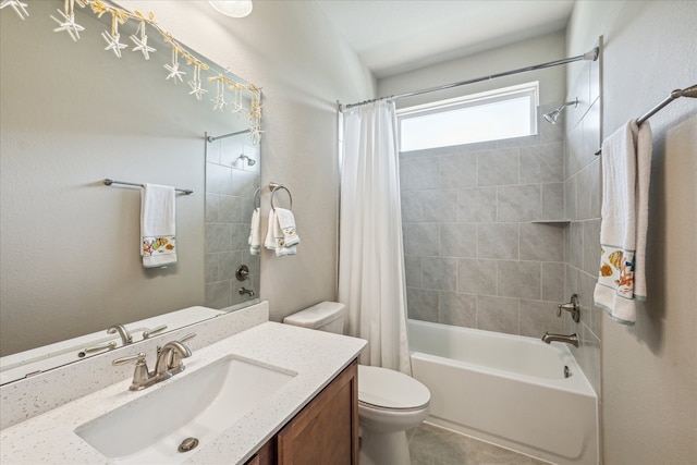 full bathroom featuring vanity, shower / bath combination with curtain, and toilet