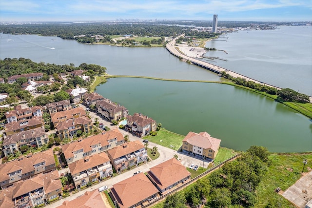 birds eye view of property featuring a water view and a residential view