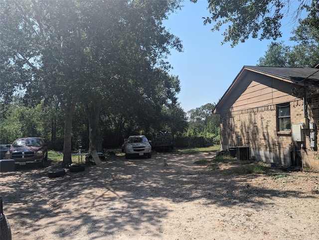 view of yard with cooling unit