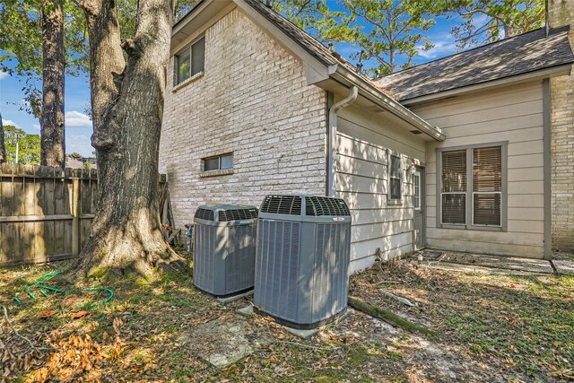 view of property exterior with cooling unit