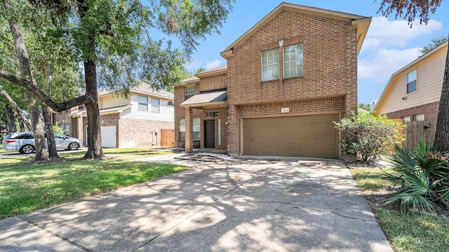 front of property with a garage and a front lawn